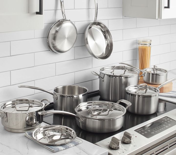 Beautiful stainless steel collection of pots on top of a glasstop stove